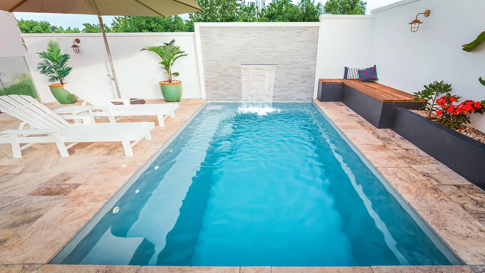 SilverGrey_Hero A Leisure Pools fiberglass inground swimming pool in Silver Grey color