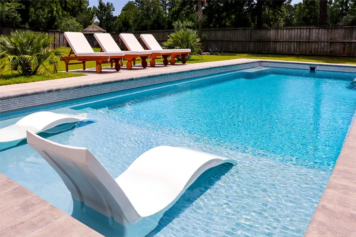 Leisure Pools Wilmington by Ocean Blue provides turnkey pool installation & outdoor living design.